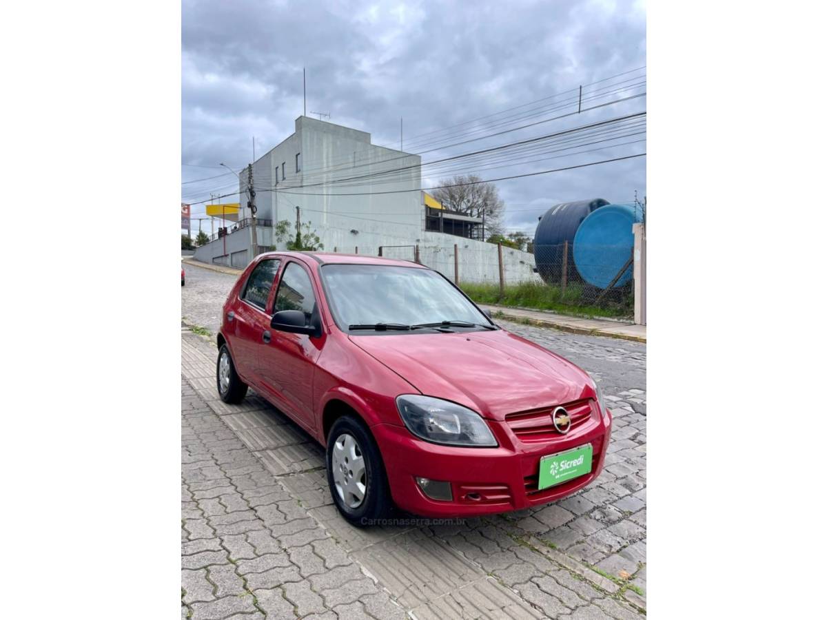 CHEVROLET - CELTA - 2010/2010 - Vermelha - R$ 27.000,00